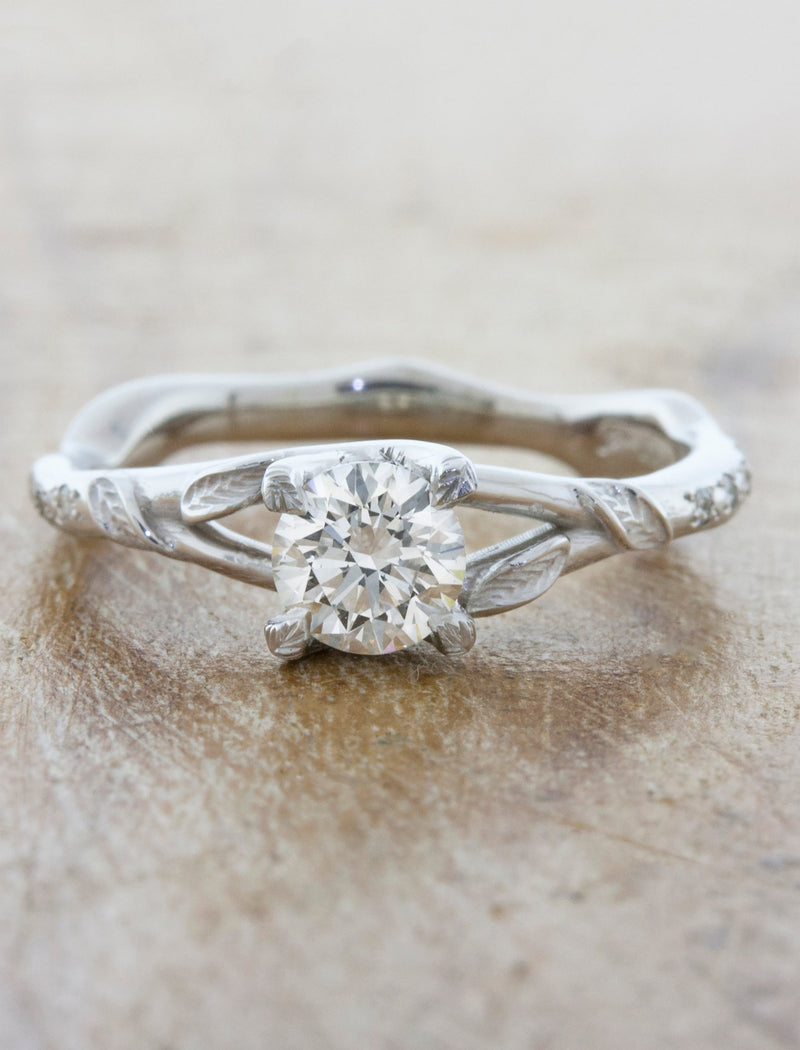 caption:Shown with 0.5ct round diamond in platinum