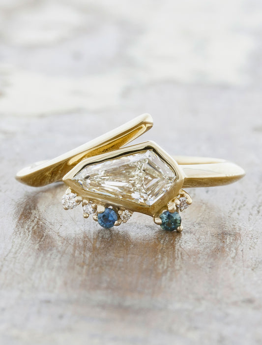 caption:Shown with kite cut diamond in 14k yellow gold 