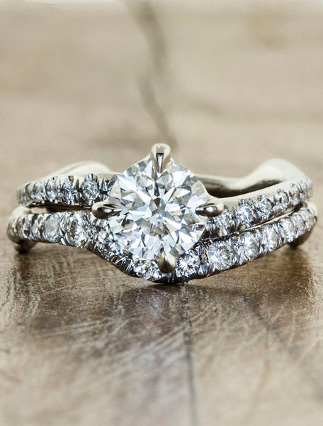 Nature inspired solitaire pave engagement ring;caption:1.50ct. Round Diamond Platinum paired with Bliss wedding band