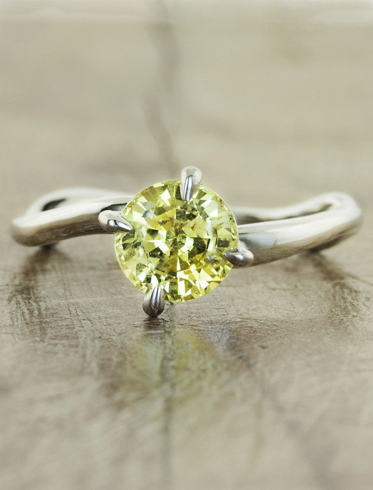 caption:Shown customized with yellow sapphire in platinum
