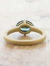 unique & modern sideways oval sapphire in brushed yellow gold band