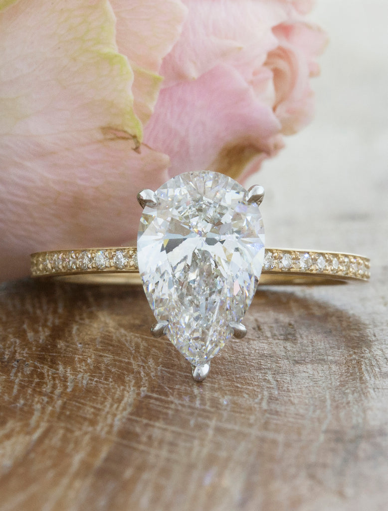 Unique engagement ring solitaire;caption:1.51ct. Pear Diamond 14k Yellow Gold and Platinum