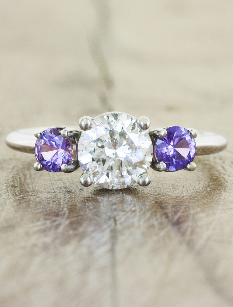 round diamond engagement ring, purple sapphire accents