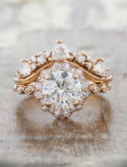 Vintage inspired engagement ring;caption:1.50ct. Round Diamond 14k Rose Gold paired with Tempest wedding band