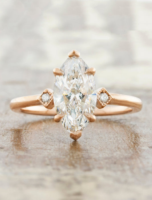 caption:Shown with a 1.5ct marquise diamond in 14k rose gold