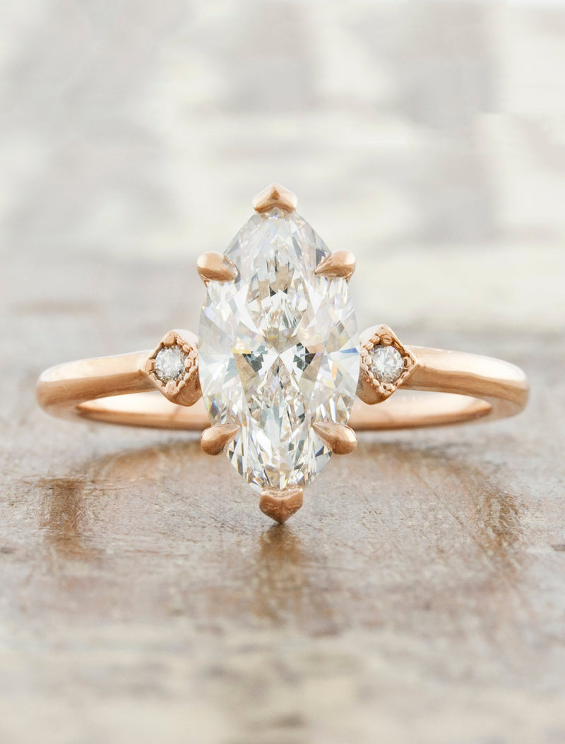 caption:Shown with a 1.5ct marquise diamond in 14k rose gold