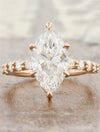 caption:Shown with 2.56ct marquise diamond in 14k rose gold