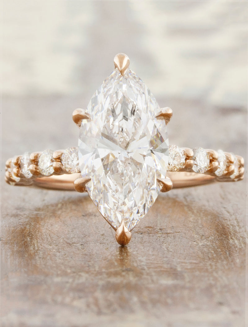 caption:Shown with 2.56ct marquise diamond in 14k rose gold
