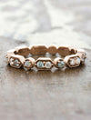 caption:Customized with aquamarines & opals in 14k rose gold