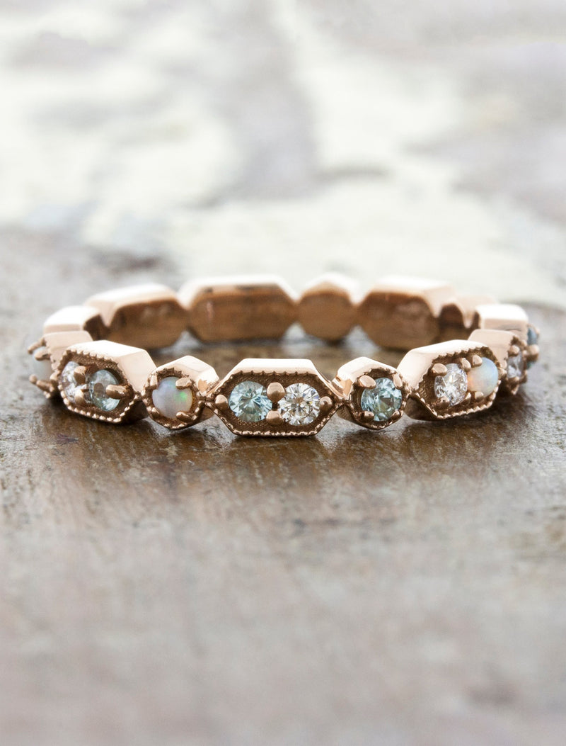 caption:Customized with aquamarines & opals in 14k rose gold