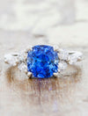 caption:Shown with 2.25ct cushion cut sapphire in platinum