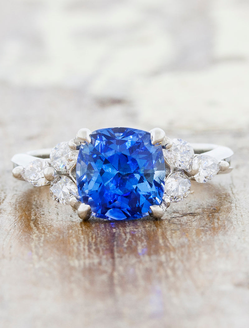 caption:Shown with 2.25ct cushion cut sapphire in platinum