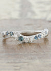 caption:Customized with blue sapphires in platinum