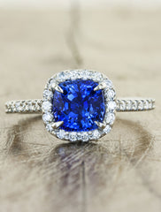 caption:Customized with a blue sapphire