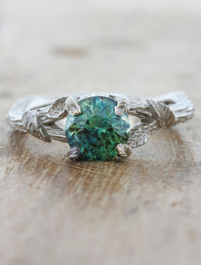 caption:Shown with 1.23ct round Montana sapphire in 14k white gold