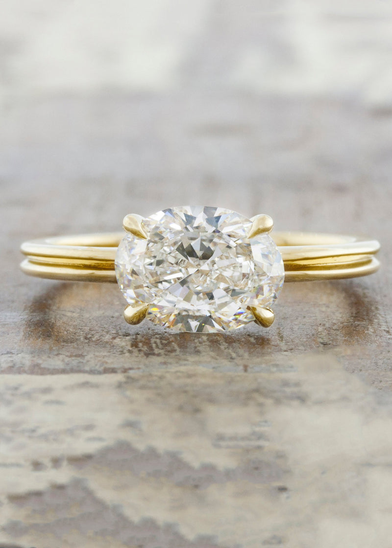caption:Customized with 1.20ct oval diamond horizontally set in 14k yellow gold
