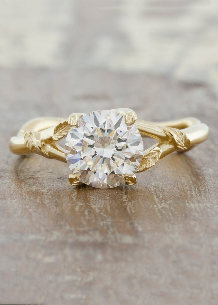 Nature inspired engagement ring;caption:1.50ct. Round Diamond 14k Yellow Gold