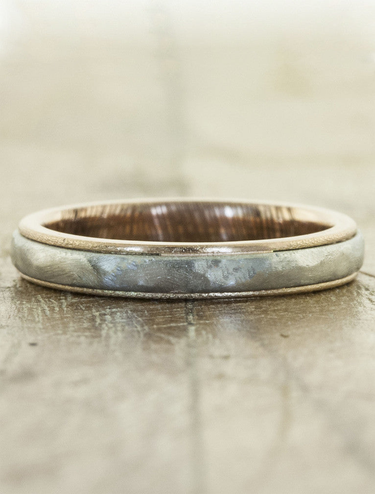 lightly hammered two-tone metal wedding band. caption:Shown in 4mm width