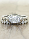 caption:Shown with Emmanuelle engagement ring