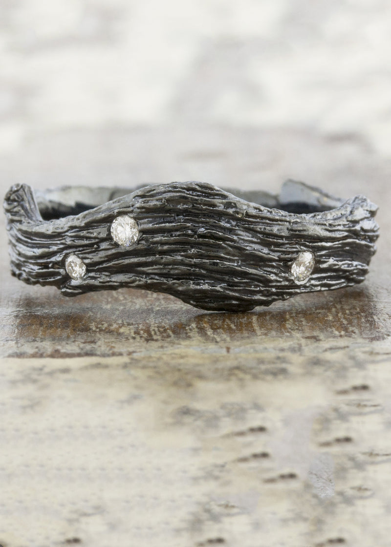 caption:Shown in custom black rhodium finish with 3 diamonds