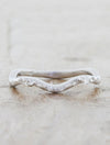 caption:Customized with studded round diamonds in the band