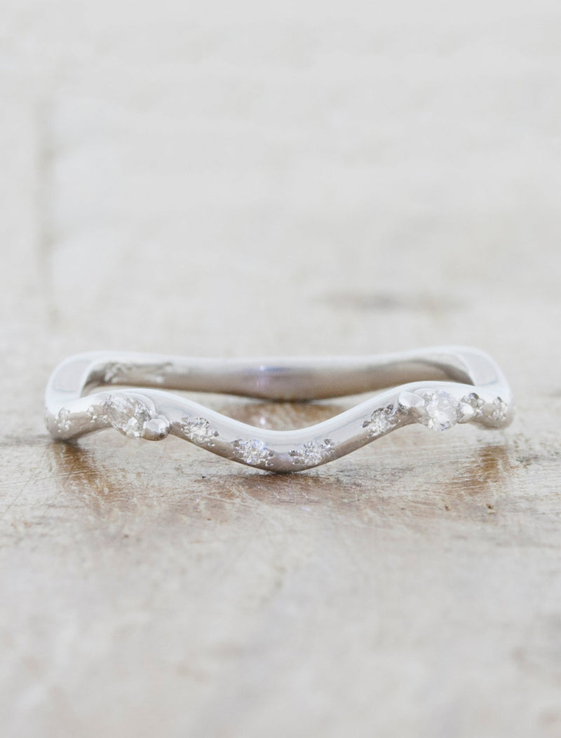 caption:Customized with studded round diamonds in the band