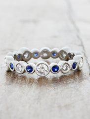caption:Customized with blue sapphire accents