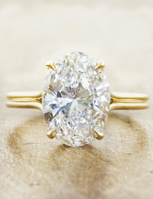 caption:Shown with 3ct oval diamond in 14k yellow gold