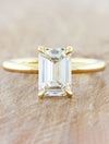 caption:Shown with 1.75ct emerald cut diamond in 14k yellow gold