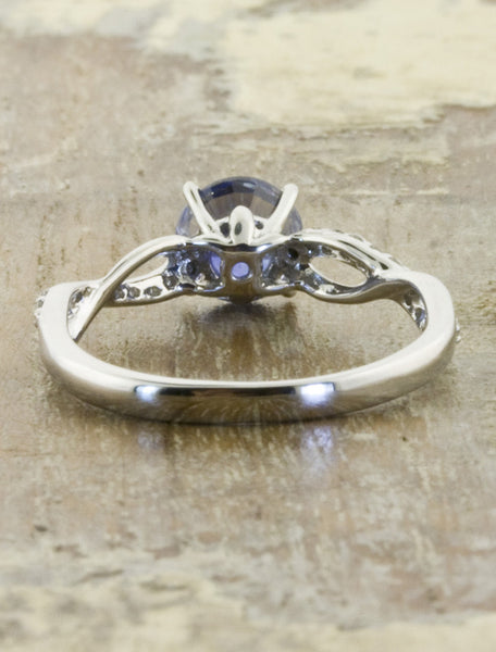  Twist band sapphire engagement ring