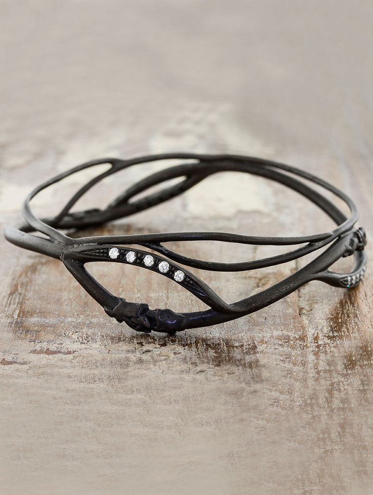 caption:Shown in oxidized silver