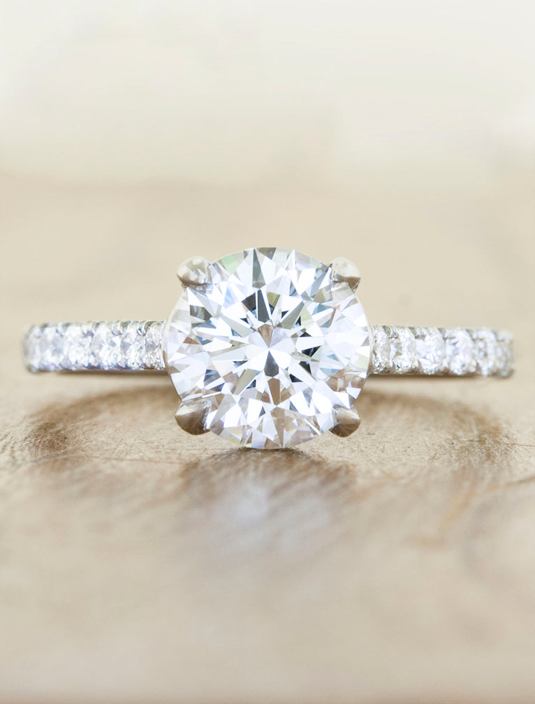caption:Shown with 1.50ct round diamond 
 in platinum