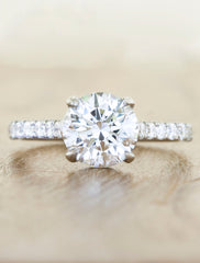 Solitaire with pave diamond band. caption:Shown with 1.50ct. Round Diamond Platinum