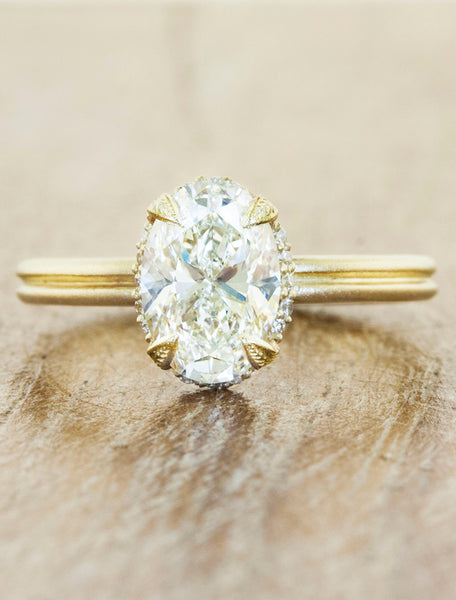 Nature inspired solitaire double band;caption:1.50ct. Oval Diamond 14k Yellow Gold