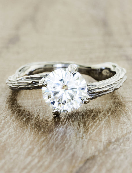 Nature inspired solitaire engagement ring caption:1.25ct. Round Diamond Platinum
