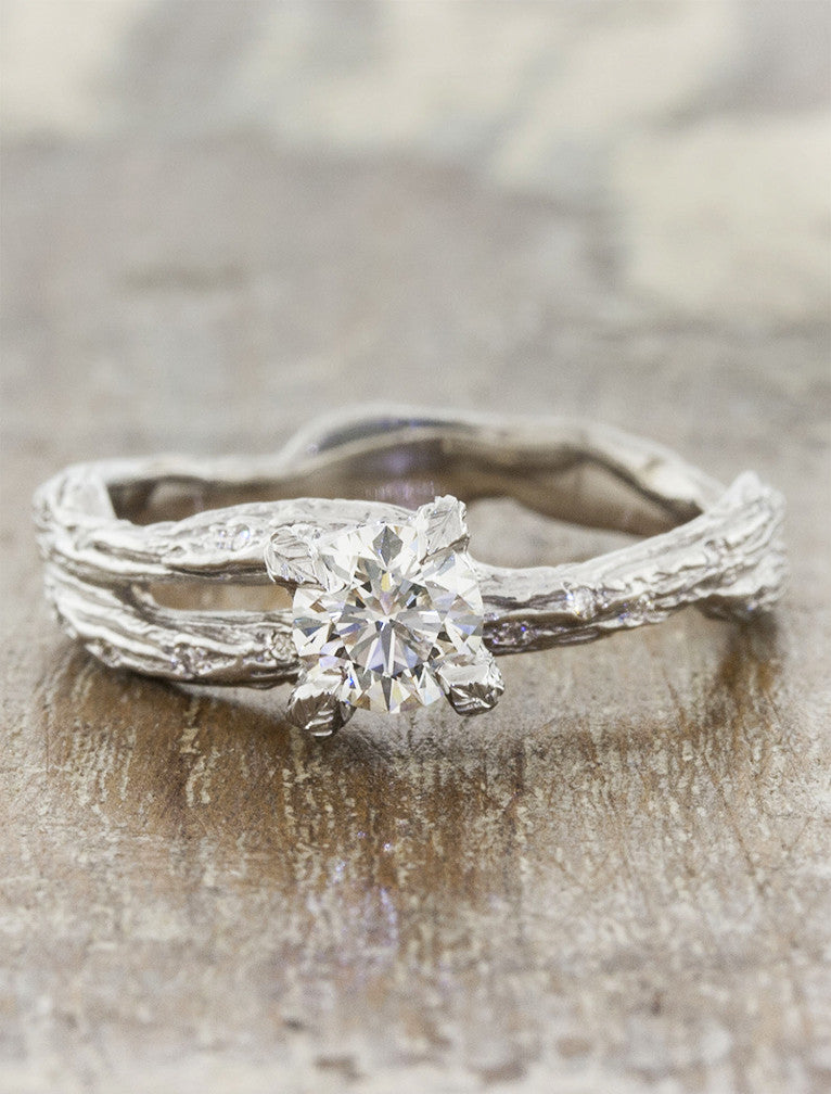 caption:Shown with 0.50ct round diamond in platinum