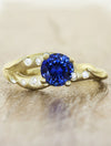 caption:Shown with round blue sapphire in yellow gold, sandblast finish