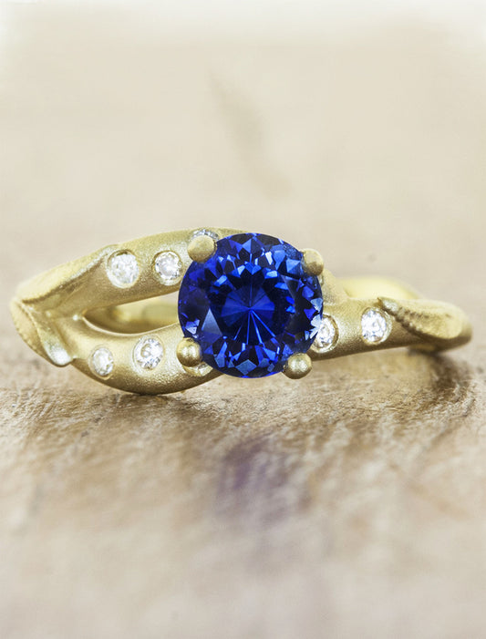 caption:Shown with round blue sapphire in yellow gold, sandblast finish