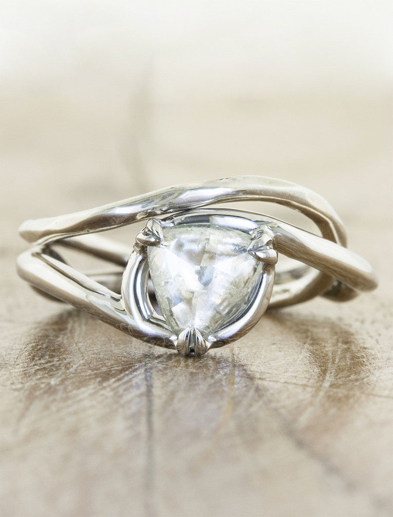 caption:Stacked with Flora wedding band in platinum