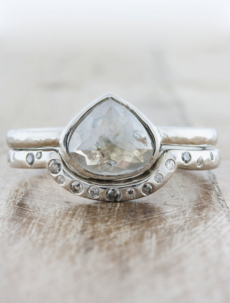 Modern bezel set engagement ring caption:2.30ct. Rustic Pear Diamond Platinum paired with Lula wedding band