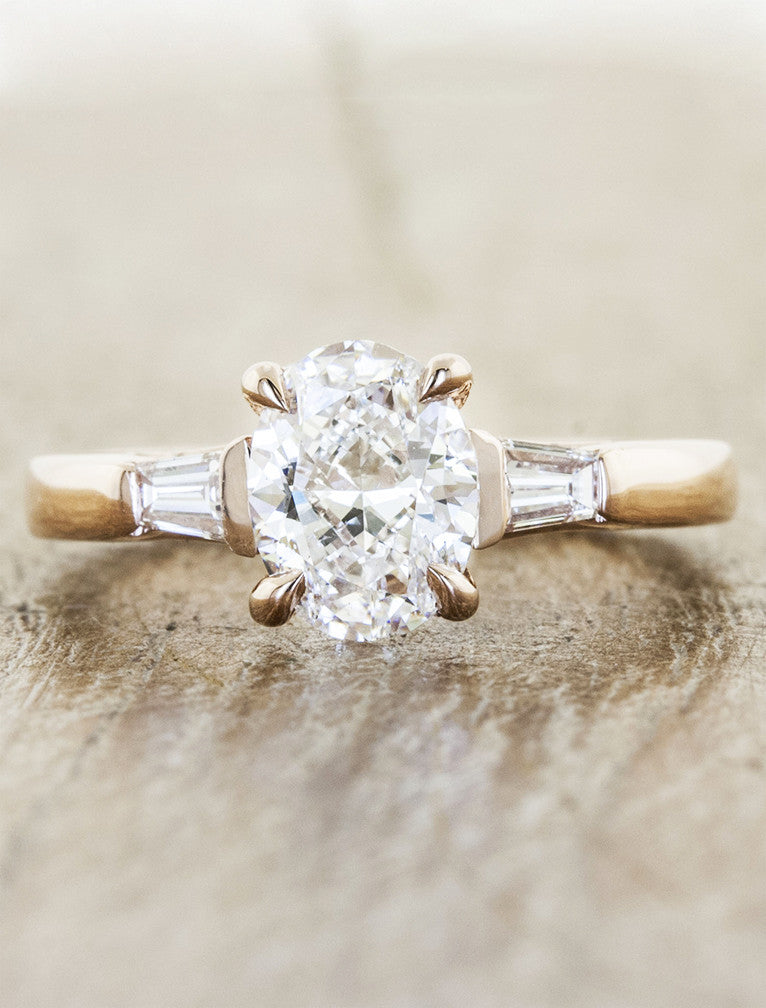 three stone diamond yellow gold ring, baguette accents;caption:Customized with an 1.30ct Oval Diamond, 14k Rose Gold