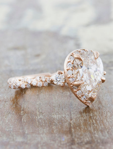 Unique pear shaped diamond rose gold engagement ring
