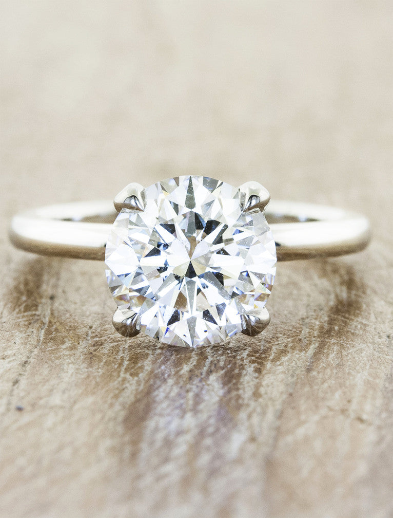 caption:Shown with 1ct round Moissanite in platinum