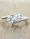 caption:Shown with two 0.7ct round diamonds in platinum