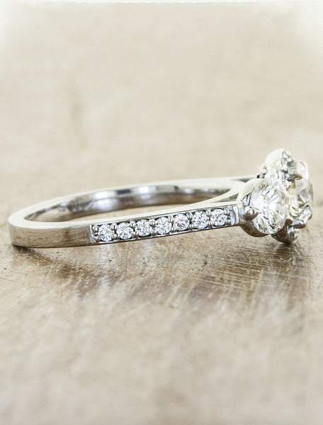 vintage-inspired three stone diamond ring, halo 