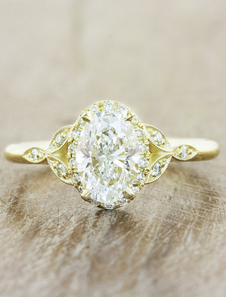 Vintage inspired halo engagement ring;caption:1.00ct. Oval Diamond 18k Yellow Gold