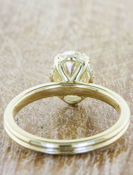 sleek modern gold band, oval diamond 4 prong engagement ring