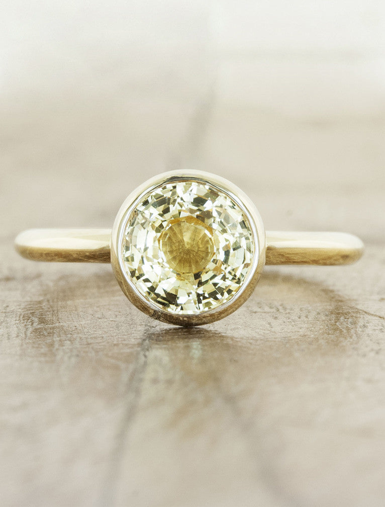 caption:Customized with a yellow sapphire