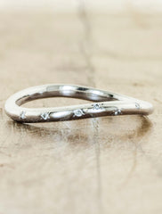 delicate curved diamond wedding band