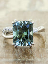caption:Shown with 5.64ct radiant cut sapphire in platinum
